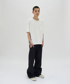 CURVED FLARE DENIM [RAW INDIGO]
